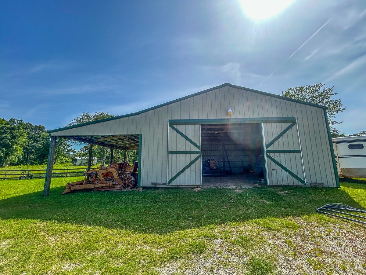 0 Fm 3179 Huntsville, TX 77340 - Photo 14 of 27 a view of a house with a yard