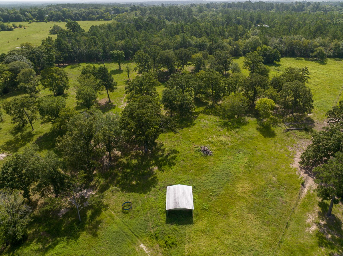 0 Fm 3179 Huntsville, TX 77340 - Photo 23 of 27 a aerial view of residential houses with outdoor space and trees