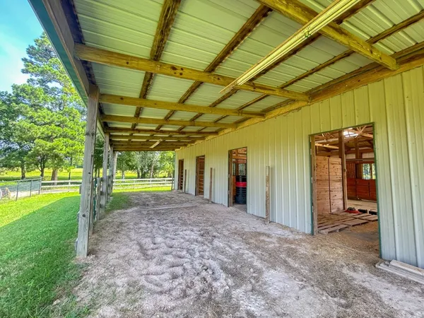 a view of a backyard of a house