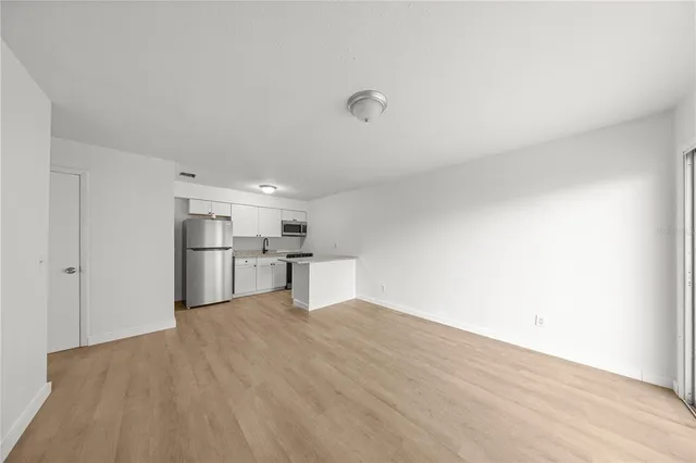 a view of an empty room and window