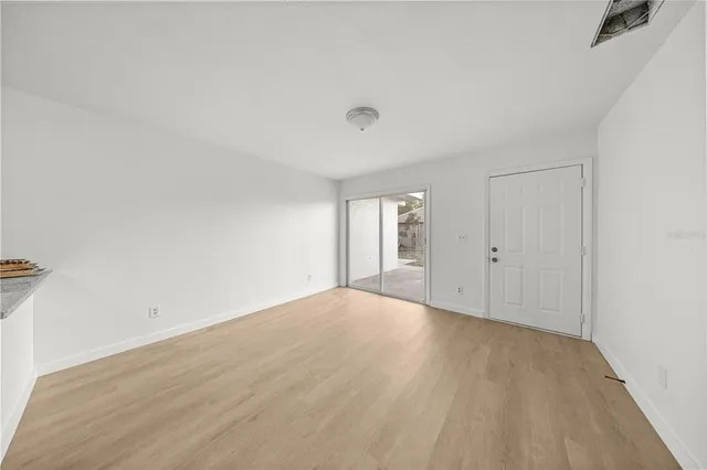 a view of a big room with carpet