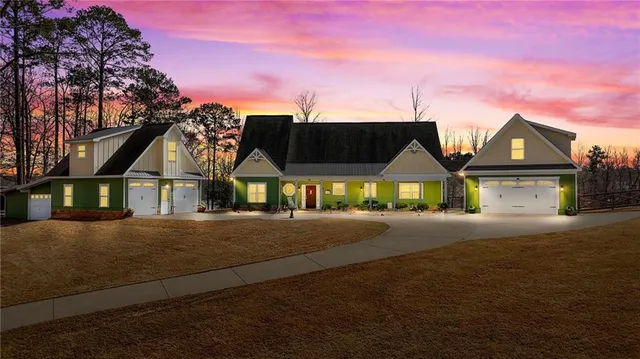 a view of house with yard and street
