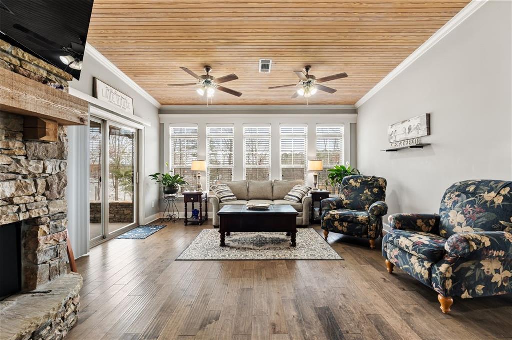 150 Crestview Road Jackson, GA 30233 - Photo 31 of 88 a living room with furniture and wooden floor
