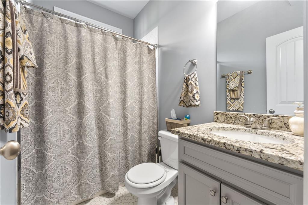 150 Crestview Road Jackson, GA 30233 - Photo 58 of 88 a bathroom with a granite countertop sink and a mirror