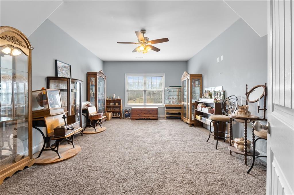 150 Crestview Road Jackson, GA 30233 - Photo 69 of 88 a living room with furniture and a large window