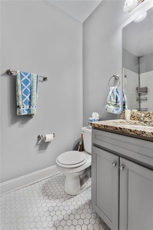 150 Crestview Road Jackson, GA 30233 - Photo 70 of 88 a bathroom with a granite countertop toilet sink and mirror