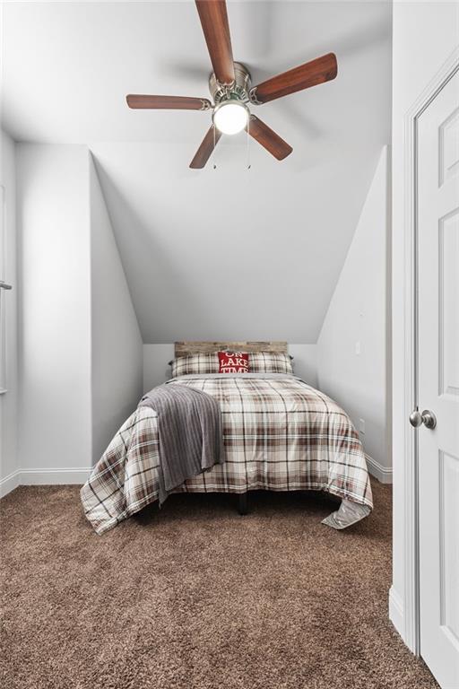 150 Crestview Road Jackson, GA 30233 - Photo 79 of 88 a bedroom with a bed and a ceiling fan