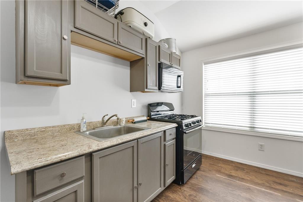 150 Crestview Road Jackson, GA 30233 - Photo 85 of 88 a utility room with a sink a cabinets and window