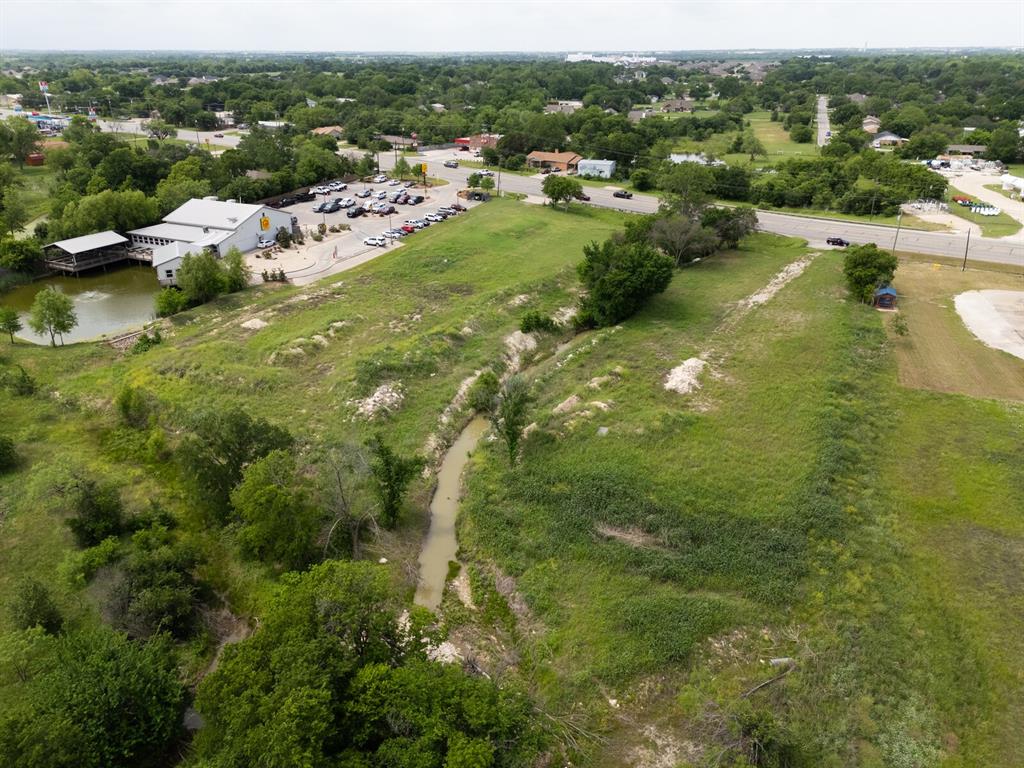 707 Robinson Drive Robinson, TX 76706 - Photo 8 of 19 an aerial view of residential houses with outdoor space and trees