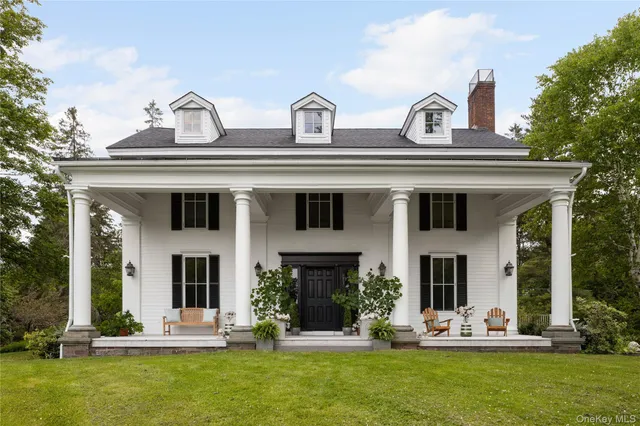 a front view of house with yard