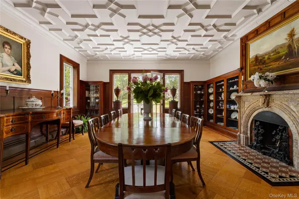 a view of a dining room with furniture window and fire pit