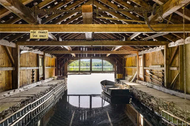 a view of chairs and table in a room