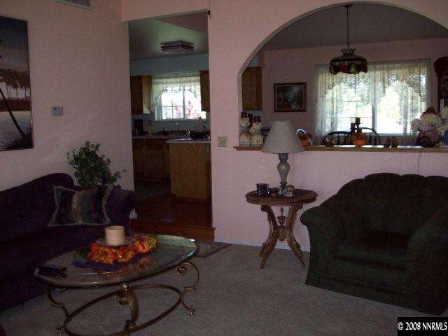 4075 Alcorn Road Fallon, NV 89406 - Photo 3 of 9 a view of a livingroom with furniture and a potted plant