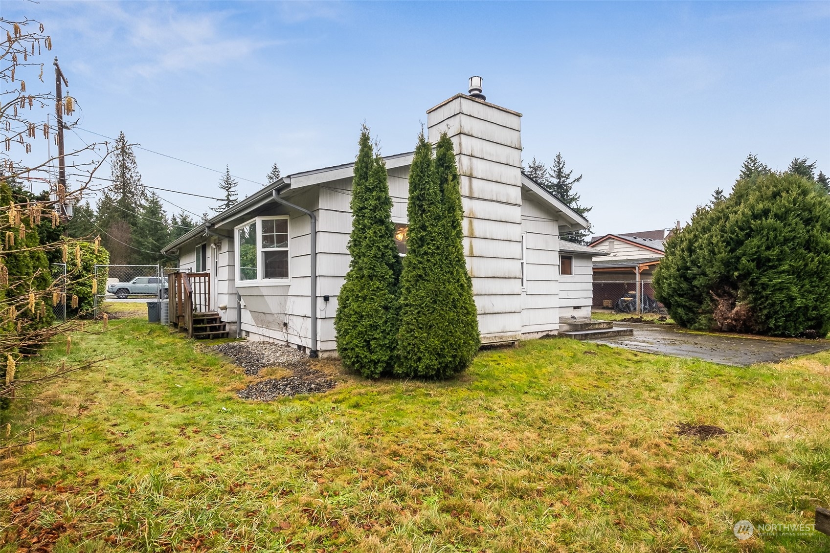 10810 Southeast 182nd Street Renton, WA 98055 - Photo 23 of 24 a view of a house with a yard