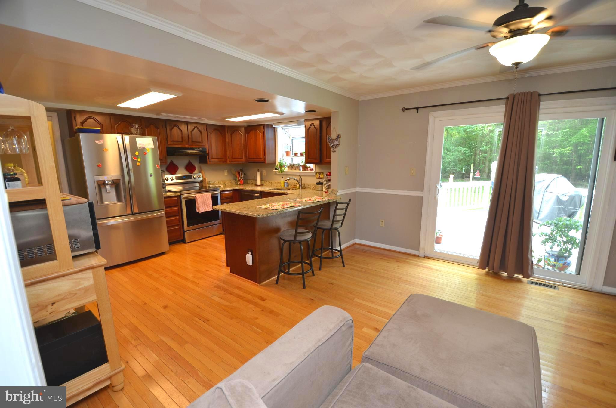 1527 Snug Harbor Road Shady Side, MD 20764 - Photo 9 of 39 Sliders to rear deck