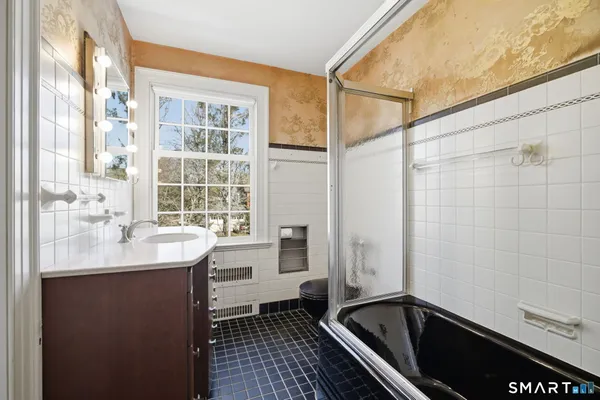 a view of an empty room with a window