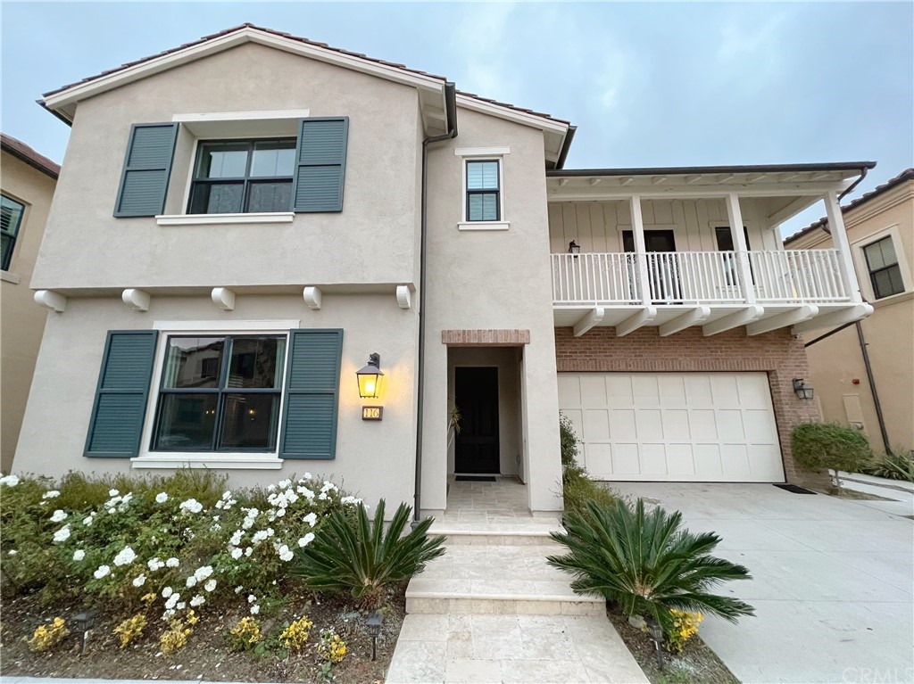 116 Alpine Irvine, CA 92620 - Photo 1 of 1 a front view of a house with a garden