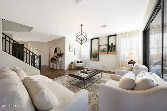 a kitchen with stainless steel appliances granite countertop a stove and a microwave