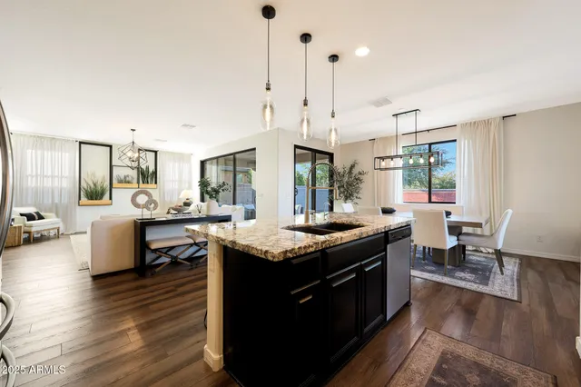 a bedroom with double bed and a large window