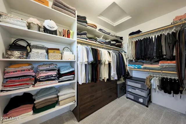a view of a patio with couches and potted plants