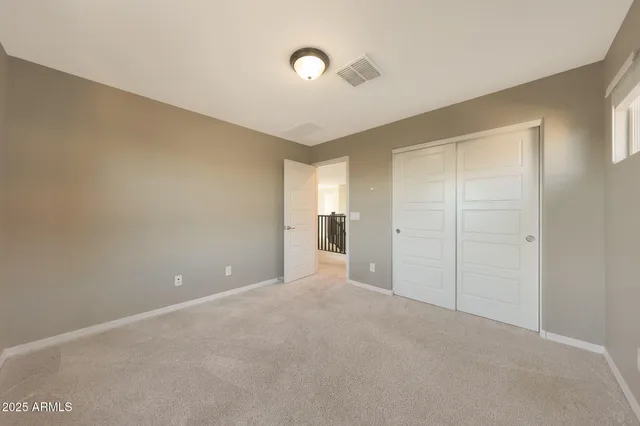 a view of a patio with swimming pool