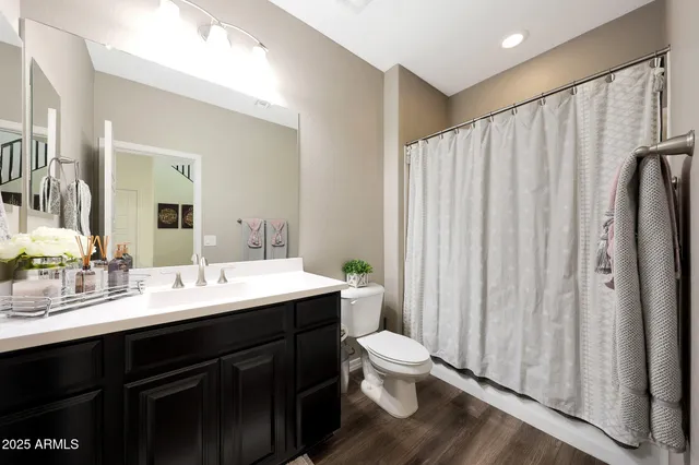 a swimming pool with outdoor seating and yard