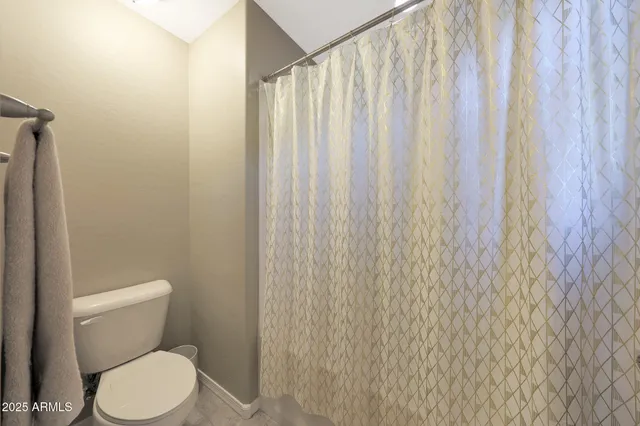 a front view of house and yard with swimming pool