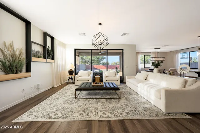 a living room with furniture and a couch