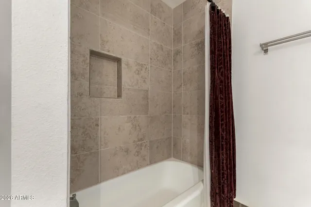 a bathroom with a bathtub