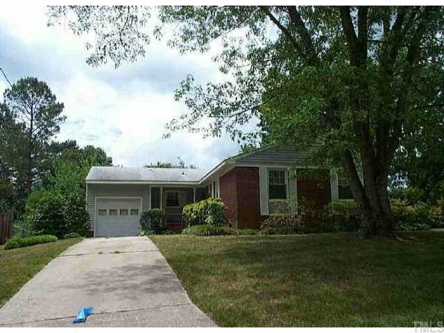 a view of house with garden