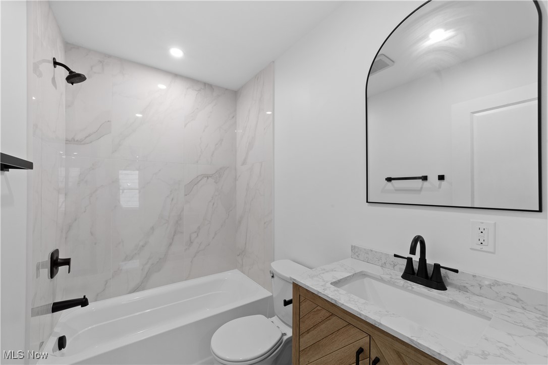 1527 Crest Road Cleveland Heights, OH 44121 - Photo 24 of 28 Full bath featuring tub / shower combination, toilet, recessed lighting, and vanity