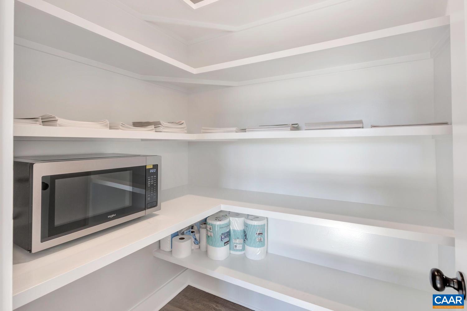 1140 Riparian Court Charlottesville, VA 22911 - Photo 23 of 57 a bathroom with a sink and a mirror