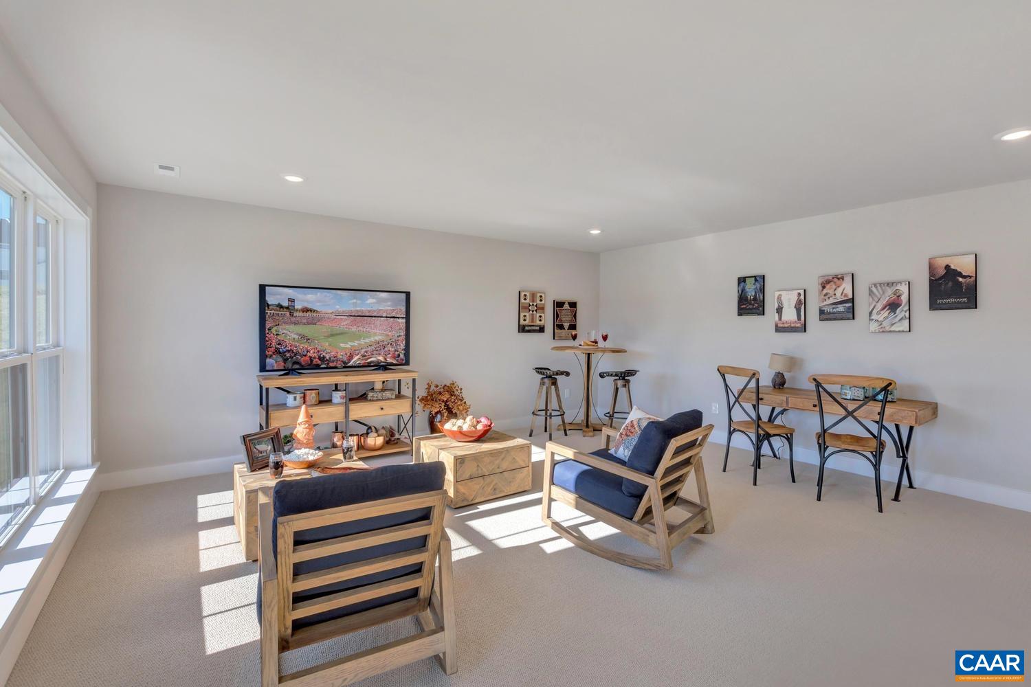 1140 Riparian Court Charlottesville, VA 22911 - Photo 41 of 57 a view of a livingroom with furniture and a couch