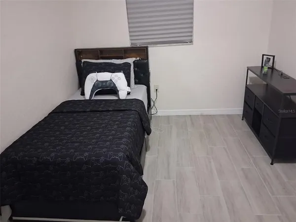 a view of staircase with wooden floor