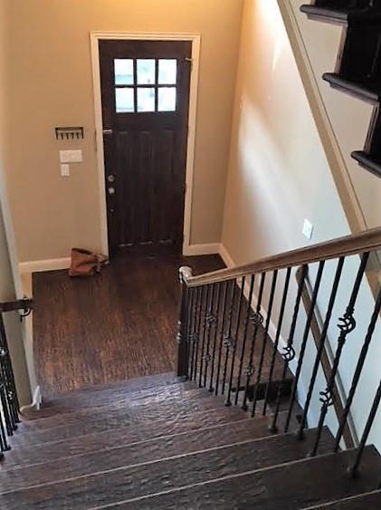 5748 Robbie Road Plano, TX 75024 - Photo 9 of 32 Up the stairs from the front door