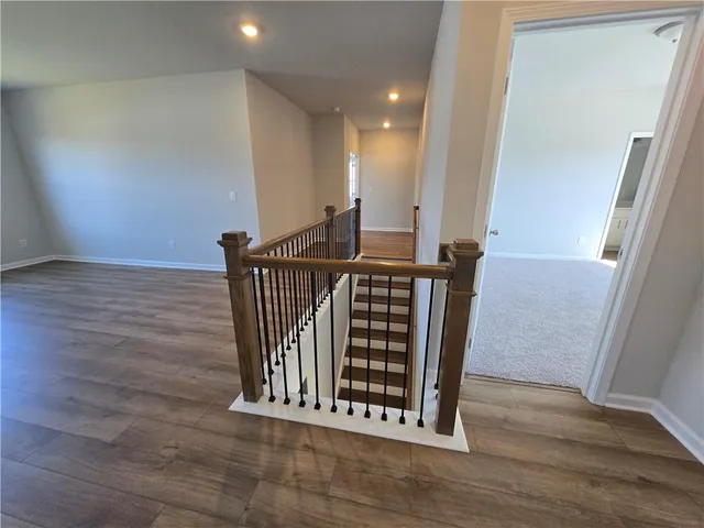 a view of entryway with wooden floor