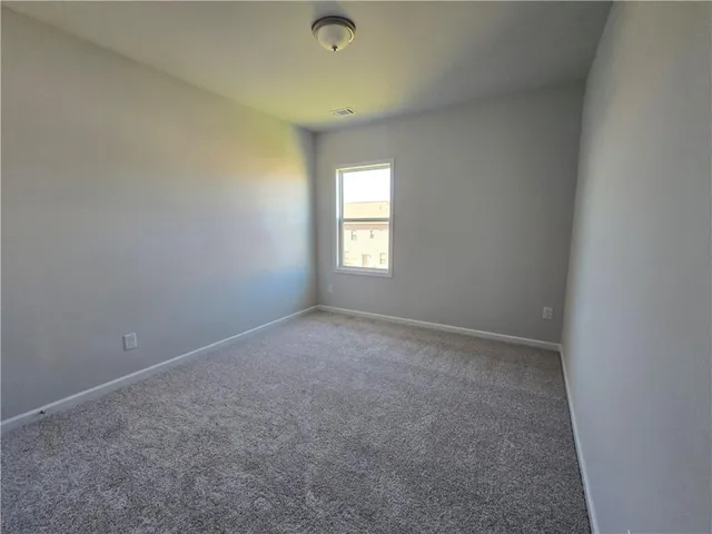 an empty room with window