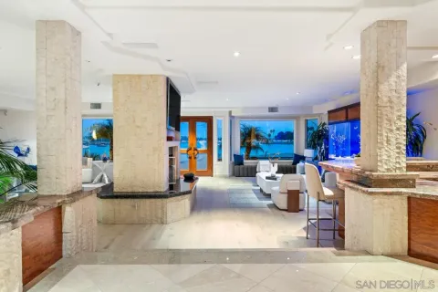 a living room with fireplace furniture and a flat screen tv