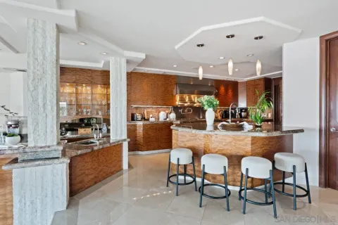 a room with table and potted plants