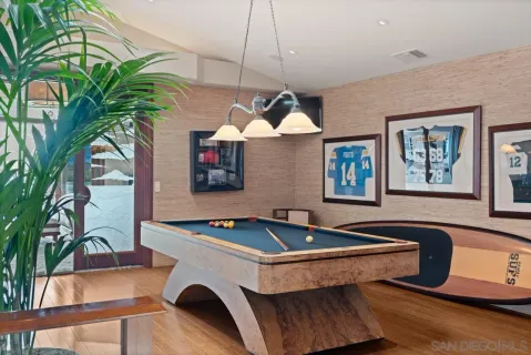 a spacious bathroom with stainless steel appliances granite countertop a sink and a mirror