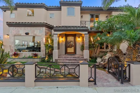 a living room with fireplace furniture and a flat screen tv