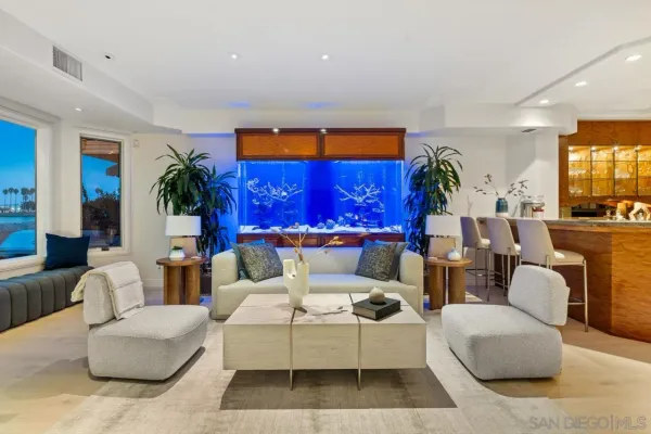 a living room with fireplace furniture and a flat screen tv