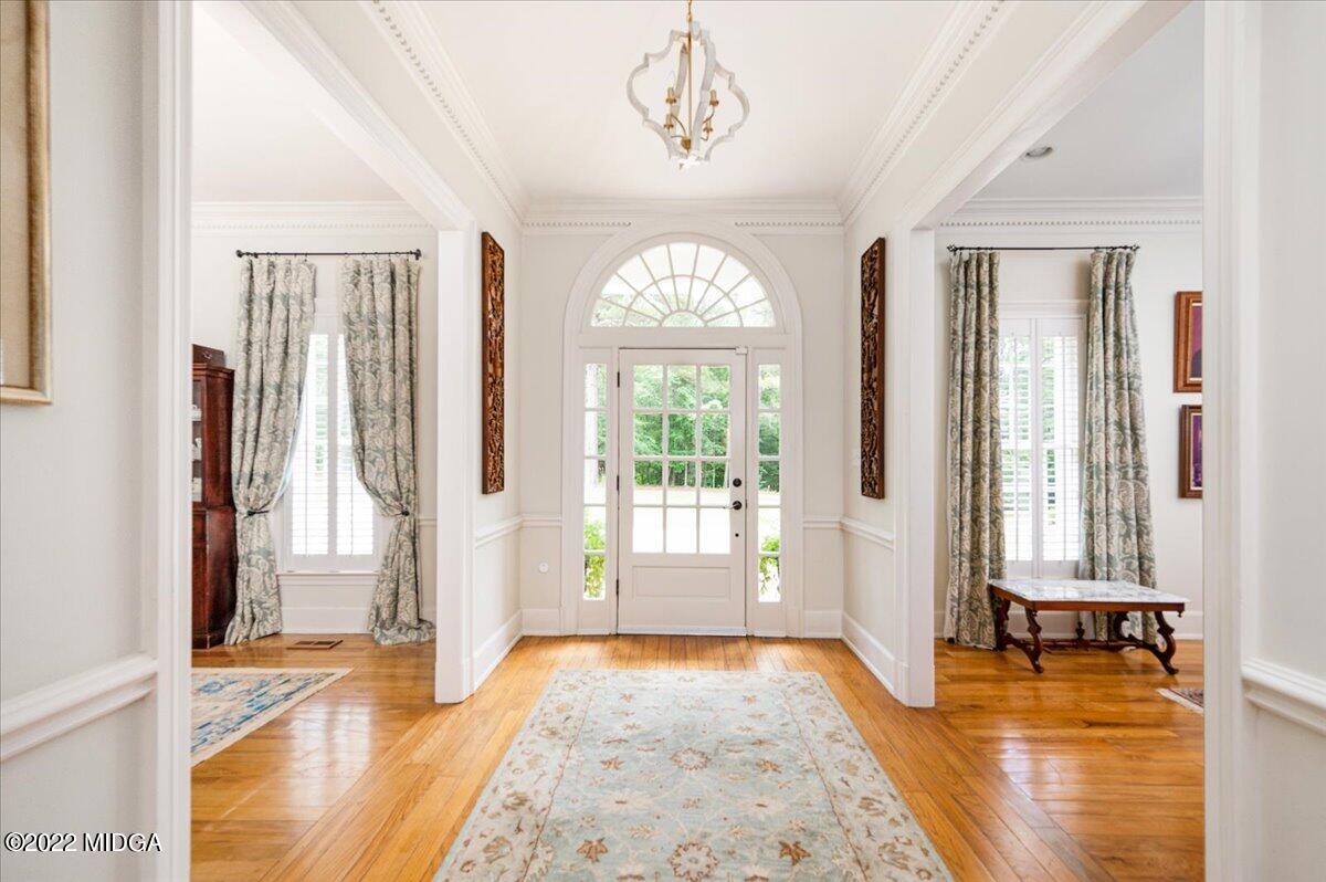788 Bass Road Macon, GA 31210 - Photo 3 of 71 a view of a livingroom with wooden floor and windows