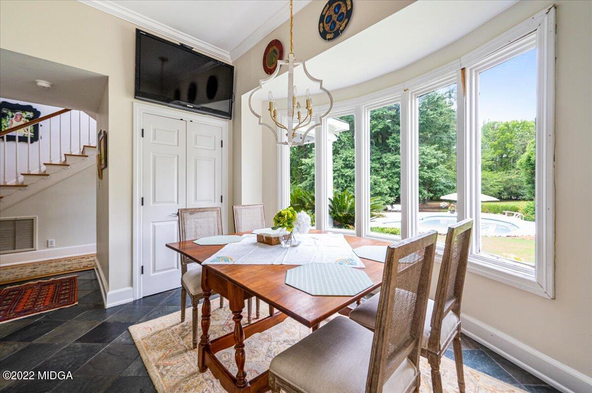 788 Bass Road Macon, GA 31210 - Photo 5 of 71 a view of a dining room with furniture window and outside view