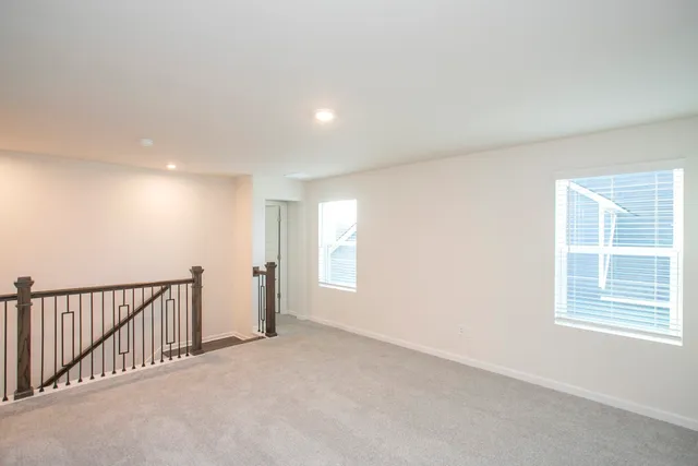 a bathroom with a sink double vanity and a mirror