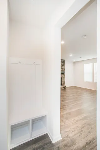 a view of a room with cabinet and mirrors