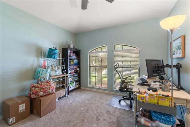 a room with furniture and a flat screen tv