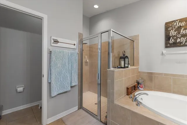 a living room with a couch and a large window