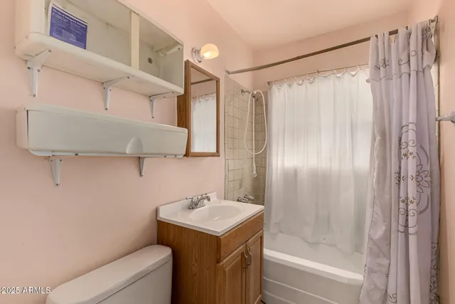 a view of yard with swimming pool and green space