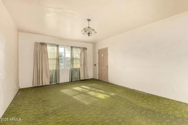 a view of an empty room with window